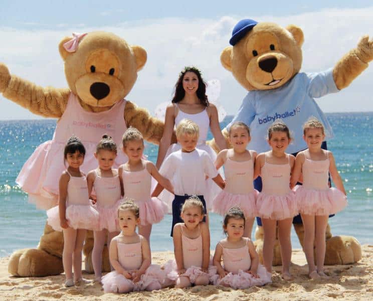 Twinkle and Teddy on the beach in Australia